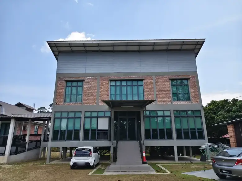 The two-storey main building seen from the front